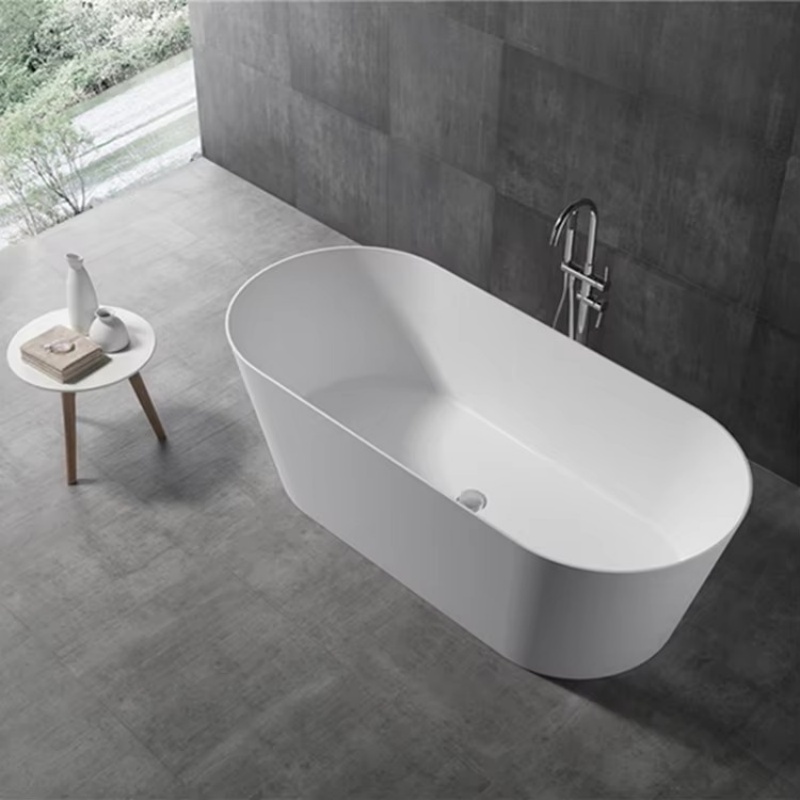 The hotel's indoor white acrylic oval bathtub features a soaking function.  8861